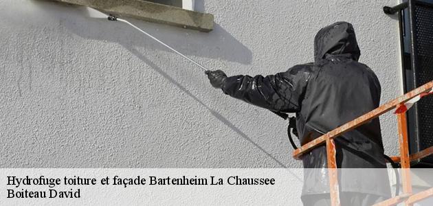 L'application des produits hydrofuges au niveau des toits des maisons à Bartenheim La Chaussee